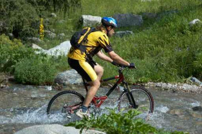 mountain biker and creek